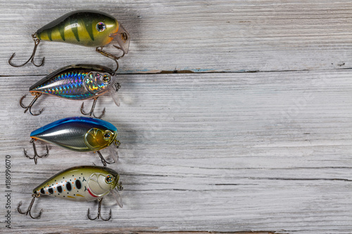 Fishing lures on wooden desk