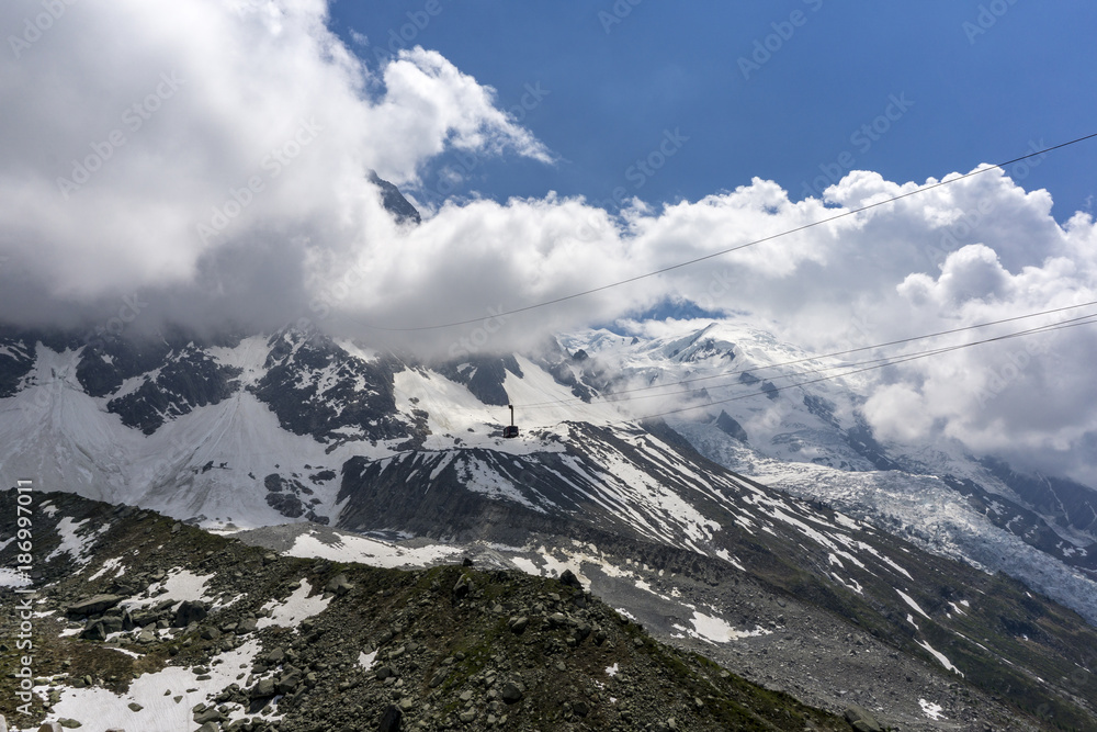 View of Mont Blanc massif and glacier in June. French Alps.