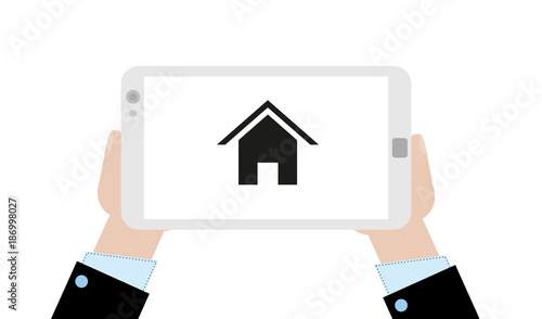 Geschäftsmann mit Tablet - Haus