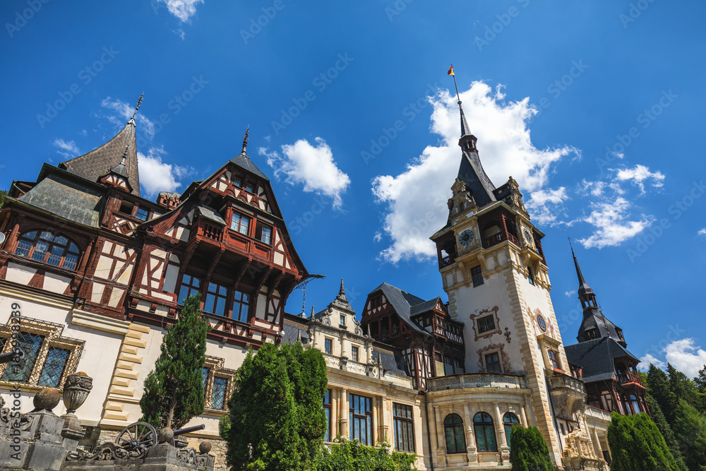 Peles Castle, Romania. Beautiful famous royal castle and ornamental garden in Sinaia landmark of Carpathian Mountains in Europe