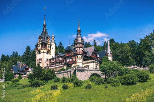 Peles Castle, Romania. Beautiful famous royal castle and ornamental garden in Sinaia landmark of Carpathian Mountains in Europe