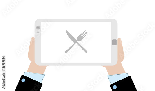 Geschäftsmann mit Tablet - Messer und Gabel - Restaurant
