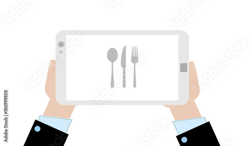 Geschäftsmann mit Tablet - Besteck - Essen