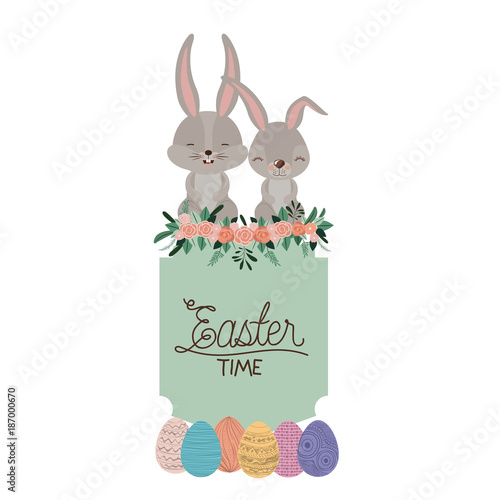 easter time frame with bunnies couple on top and easter eggs and ornament floral in colorful silhouette