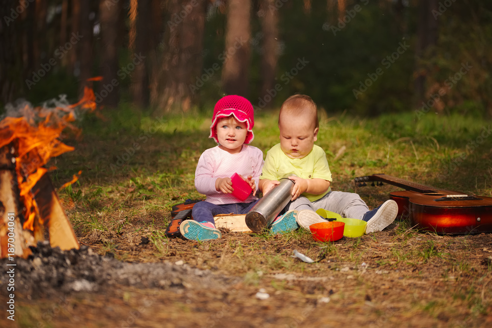 happy children hiking in the forest happy children hiking in the forest