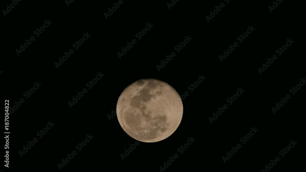 The Yellow Moon Rises from The Bottom Edge to The Top The Yellow Moon Rises from The Bottom Edge to The Top