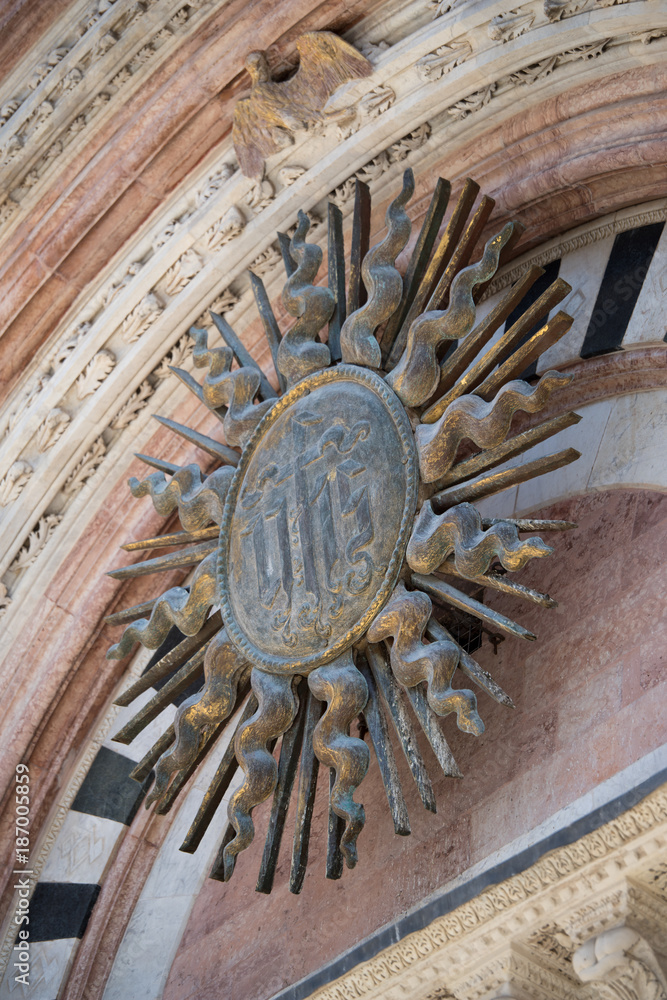 Solar disc at the entrance to the Duomo, Siena, Italy