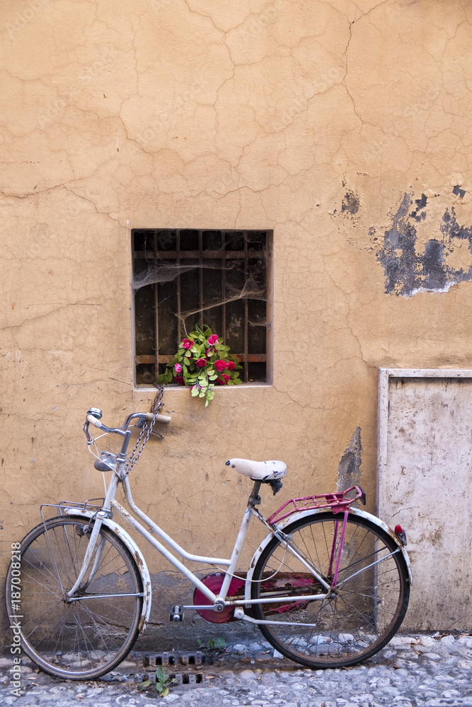 Rieti (Italy), white bicycle and flowers