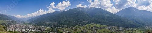 Fototapeta Naklejka Na Ścianę i Meble -  Alps mountain landscape with a city