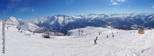 ski slopes in mountain panorama in winter
