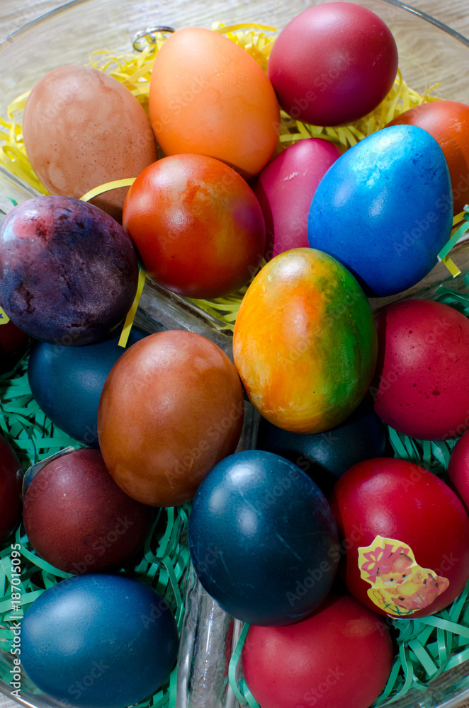 colorful Easter eggs in basket isolated, close up top view colorful Easter eggs in basket isolated, close up top view