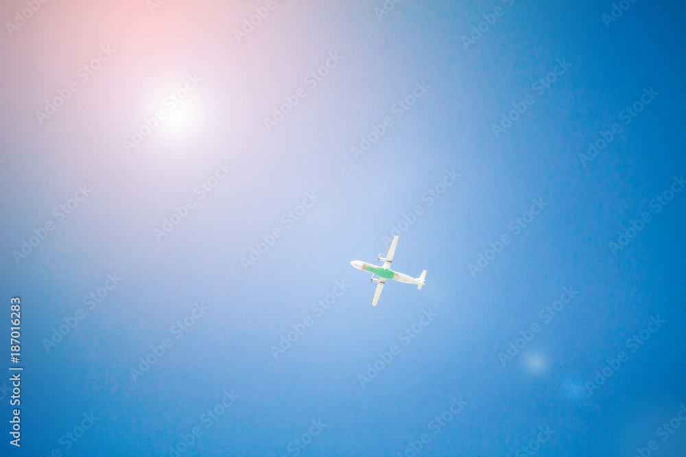 Airplane flying with blue sky