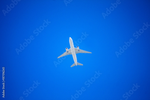 Airplane flying with blue sky