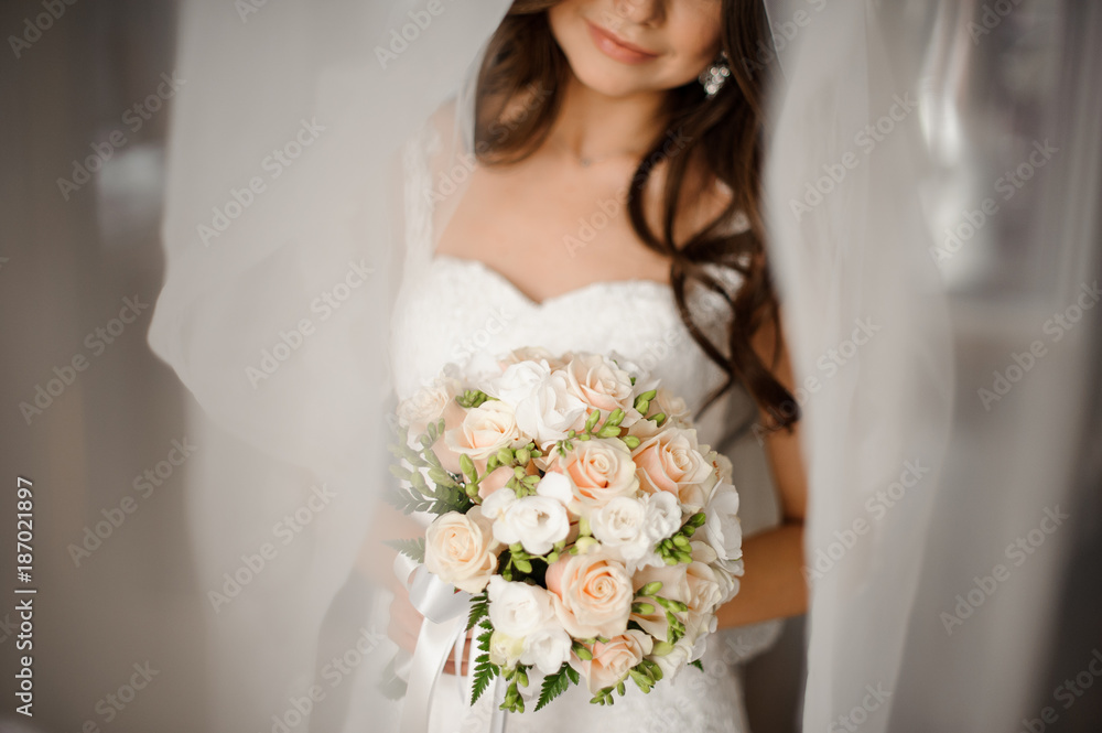 elegant bouquet with roses and fern in brides hands elegant bouquet with roses and fern in brides hands