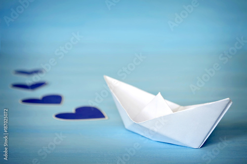 Paper boat and hearts