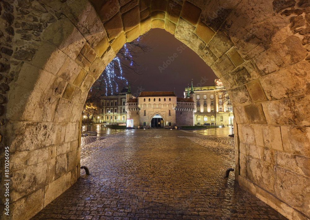 Krakow by night / the old town and historical architecture.
