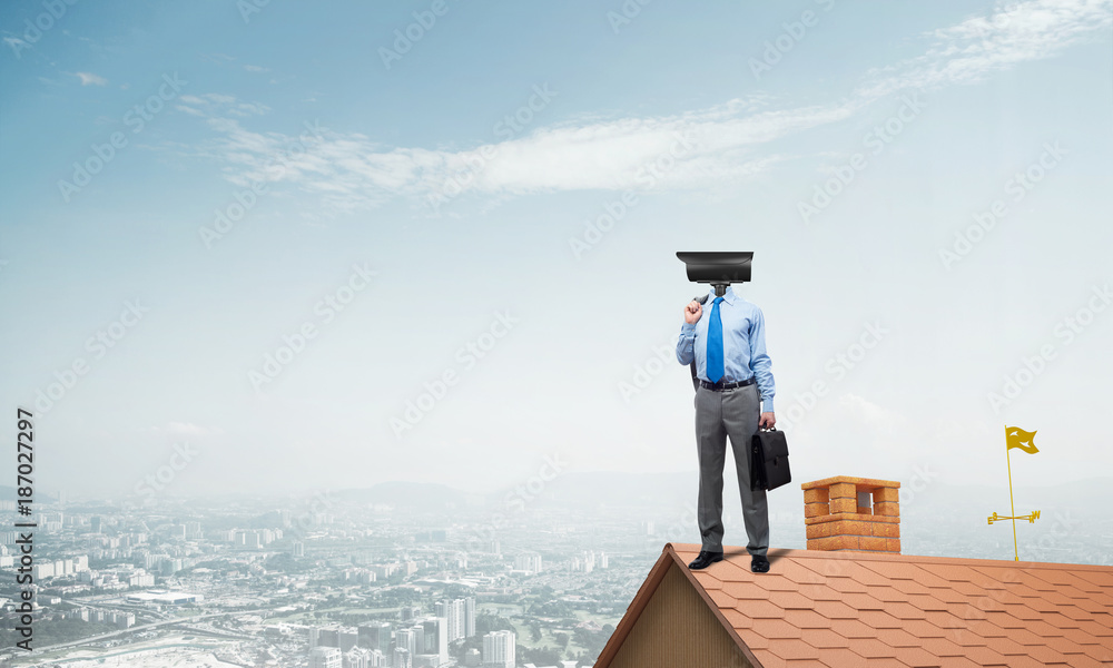 Concept of home security and privacy protection with camera headed man Concept of home security and privacy protection with camera headed man