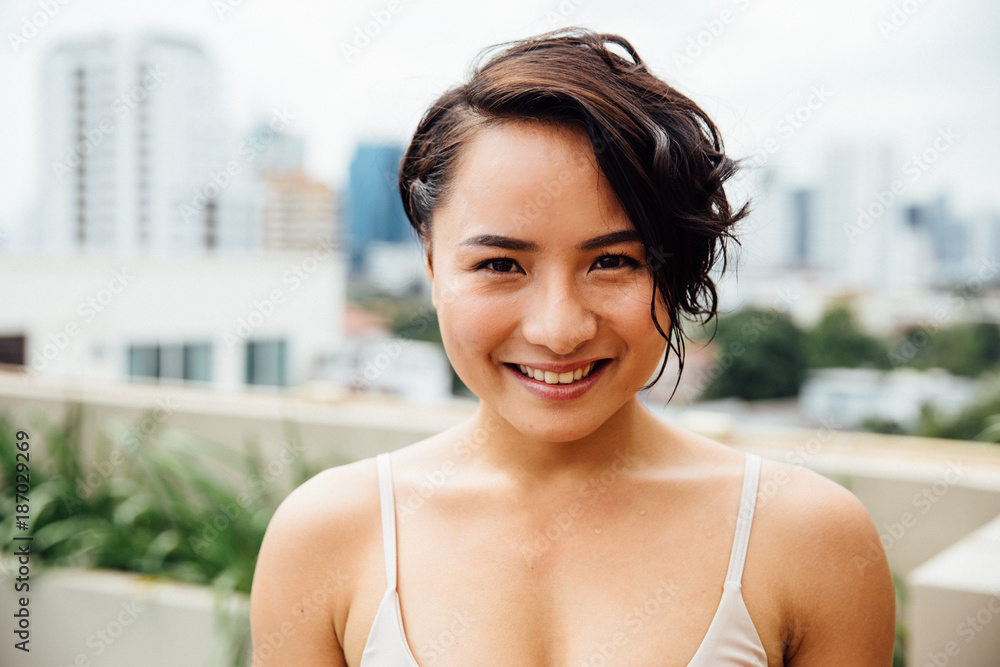 Portrait of a Young Asian Woman Laughing