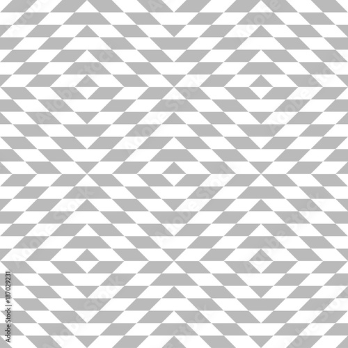 Abstract geometric patern with rhombuses. A seamless vector background. Grey and white texture. Graphic modern pattern