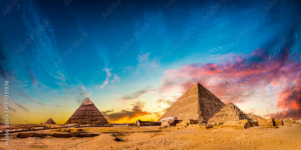 Great Pyramids of Giza, Egypt, at sunset - obrazy, fototapety, plakaty 