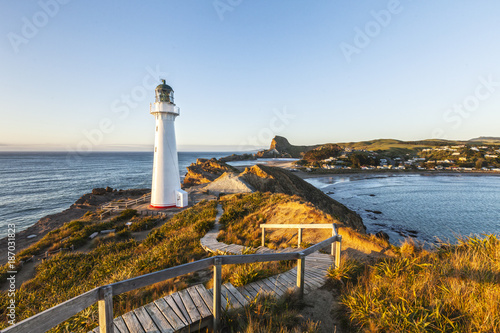 Castlepoint Lighthouse, Wairarapa, New Zealand, at sunrise.