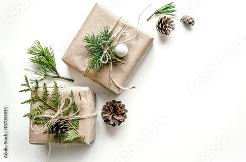 Christmas composition. Gift wrapping in Eco-style. Christmas background for presentation of work or text. Copy space. Top view