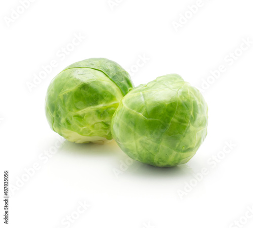 Boiled Brussels sprout isolated on white background two whole heads.