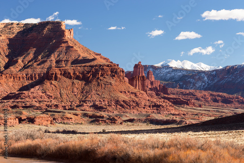 Fisher Towers Recreation site is along Utah`s Scenic Colorado River way into Moab Utah. The Lasal Mountains are a snow covered backdrop to the Fisher Towers. photo
