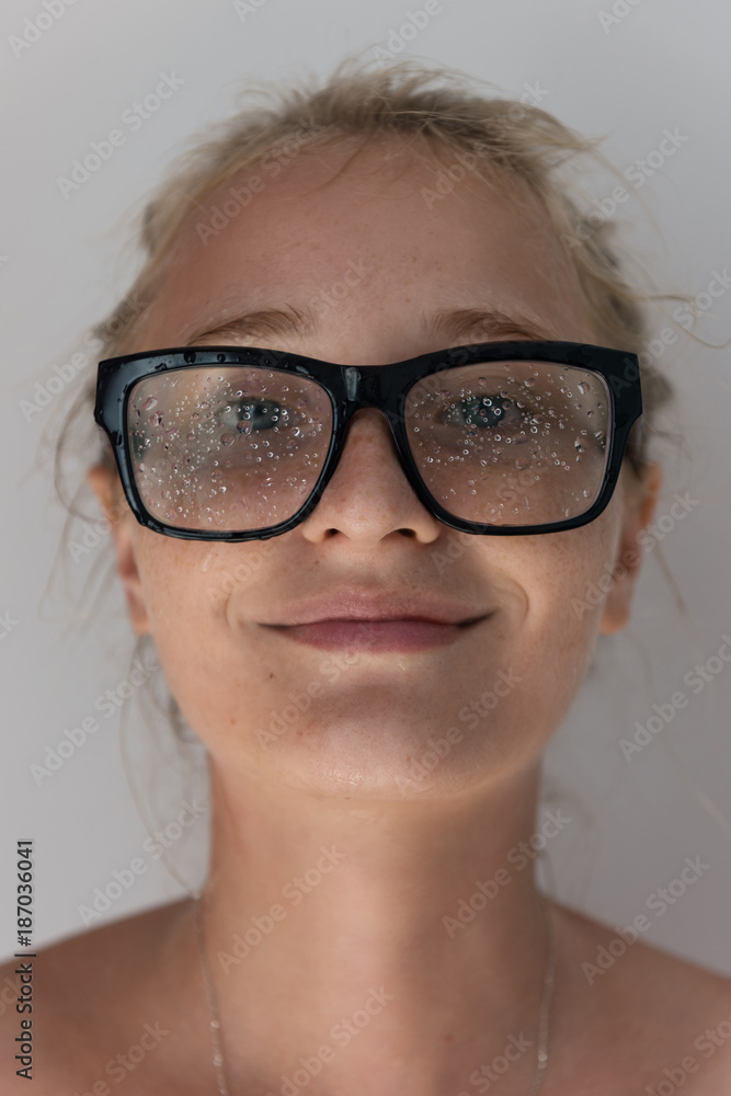 Woman in wet glasses Woman in wet glasses