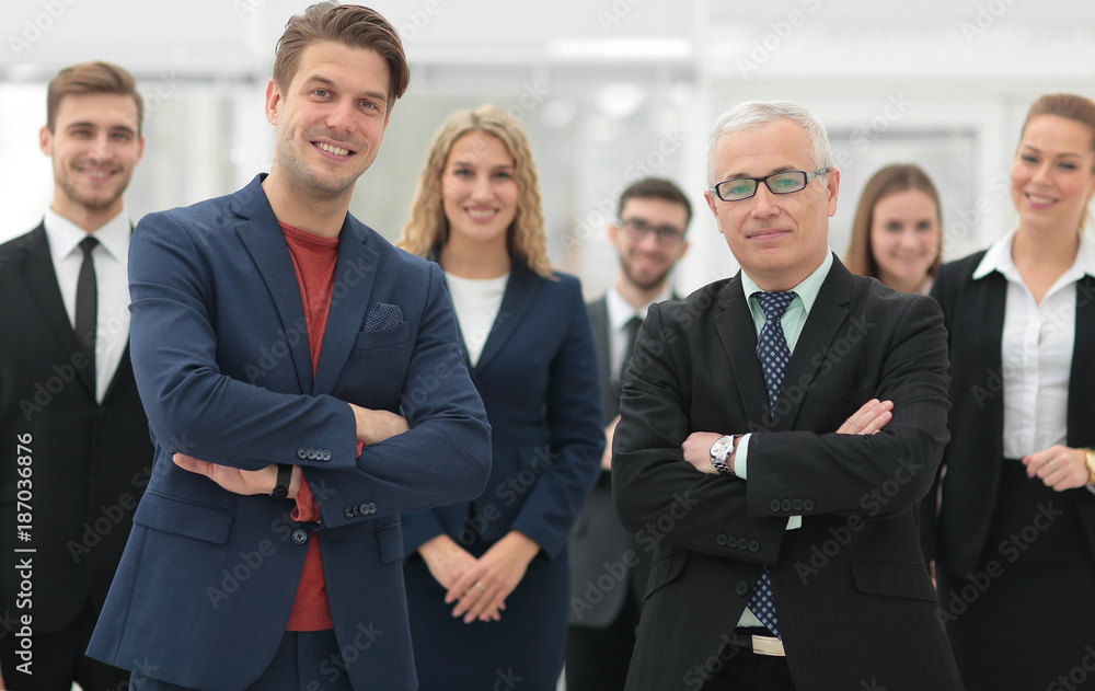 business partners standing in front of the business team. business partners standing in front of the business team.