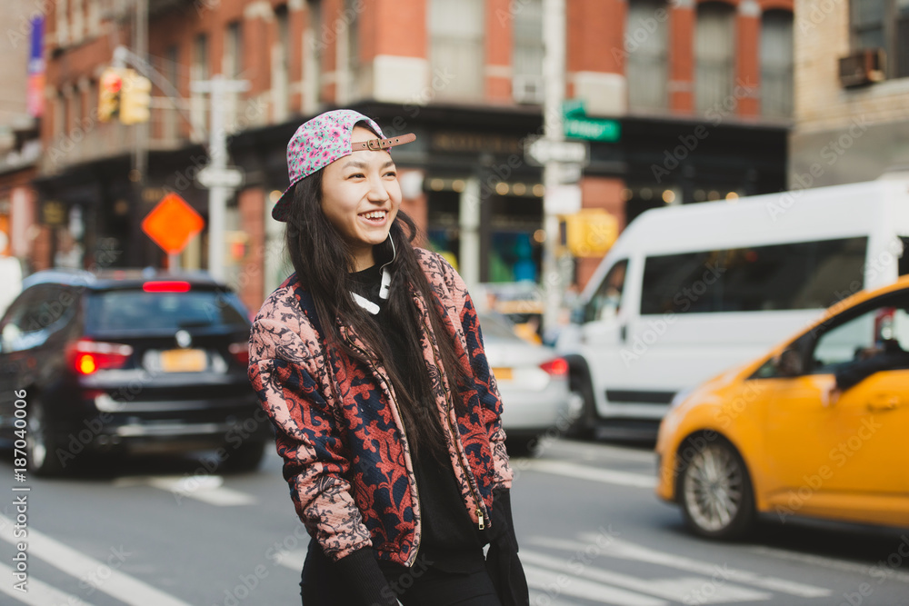 Portrait of happy young stylish woman in the city Portrait of happy young stylish woman in the city