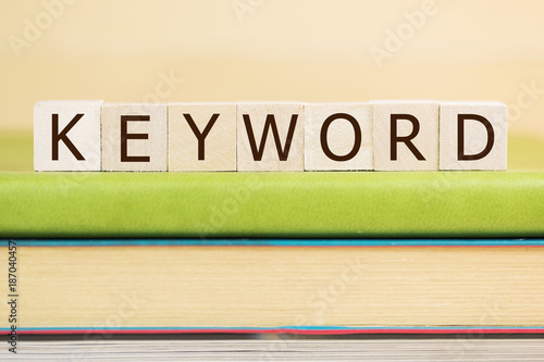 Keyword word on wooden cubes background, SEO concept