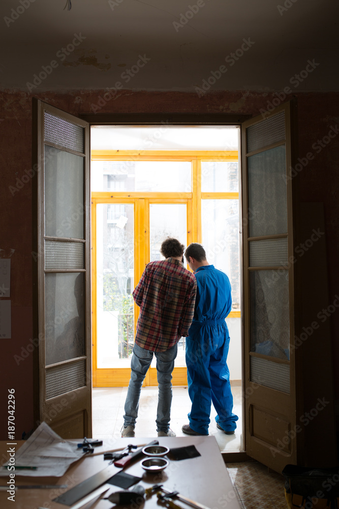 Carpenters through the doorway. Carpenters through the doorway.