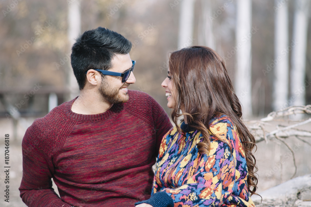 Fototapeta premium attractive man and woman smiling and kissing