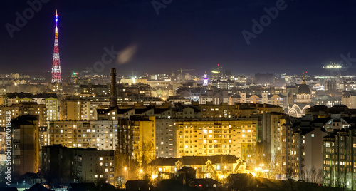 Panorama of night aerial view of Ivano-Frankivsk city  Ukraine with bright lights and high buildings.