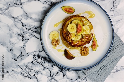 Gluten free banana pancakes on the light background. Top view