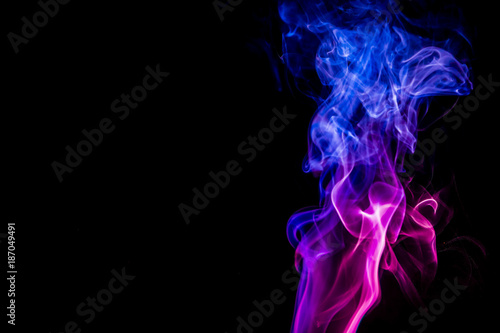 Colored smoke on black background