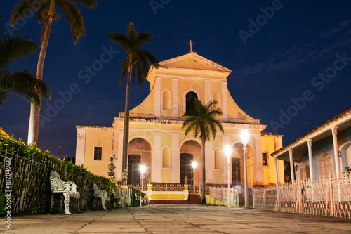 Trinidad Cathedral illuminated by streetlights in the blue hour