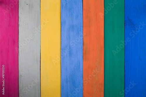 multicolored festive wooden background of boards