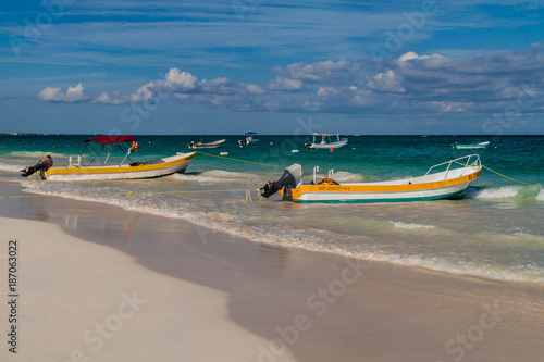 TULUM, MEXIO - FEB 29, 2016: Boats at the Caribbean beach in Tulum, Mexico