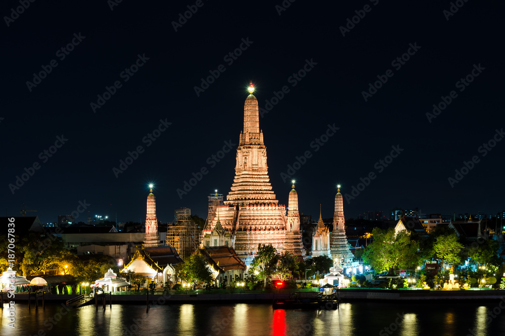 Night view of Wat Arun temple and Chao Phraya River, Bangkok, Thailand