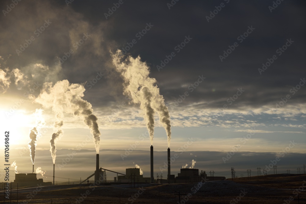 Sunset silhouette, smoke plumes, coal fired power station, Gillette