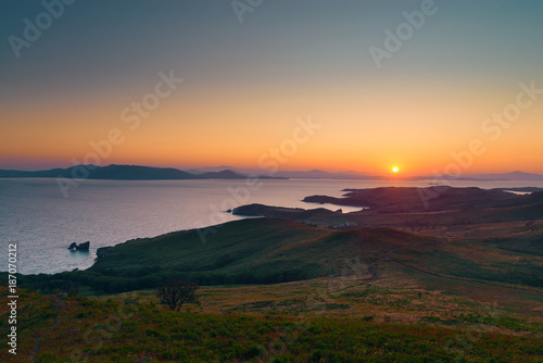  Sunrise on the peninsula on behalf of Krabbe in Japanese sea.