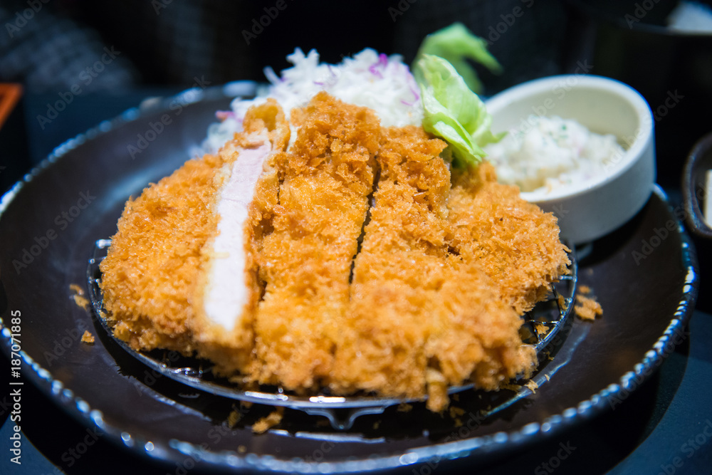 Fried pork tongkatsu with mashed potatoes and vegetable Fried pork tongkatsu with mashed potatoes and vegetable