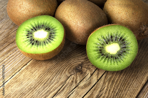 Kiwi fruits on wooden table