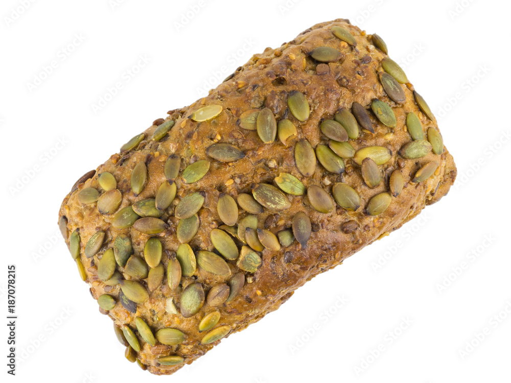 A loaf of bread from wheat flour with sunflower, pumpkin, caraway, cereal and sesame seeds. Isolated. Top view. A loaf of bread from wheat flour with sunflower, pumpkin, caraway, cereal and sesame seeds. Isolated. Top view.