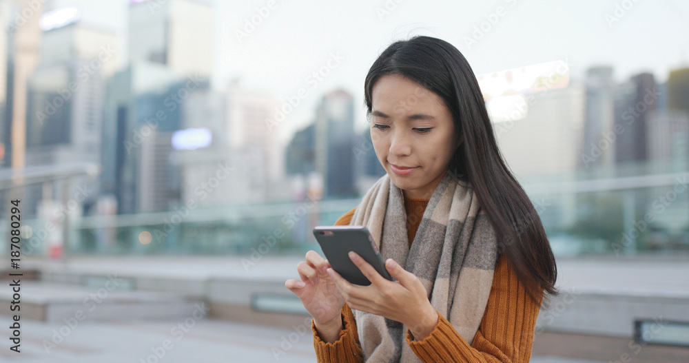 Young Woman use of smart phone at outdoor Young Woman use of smart phone at outdoor