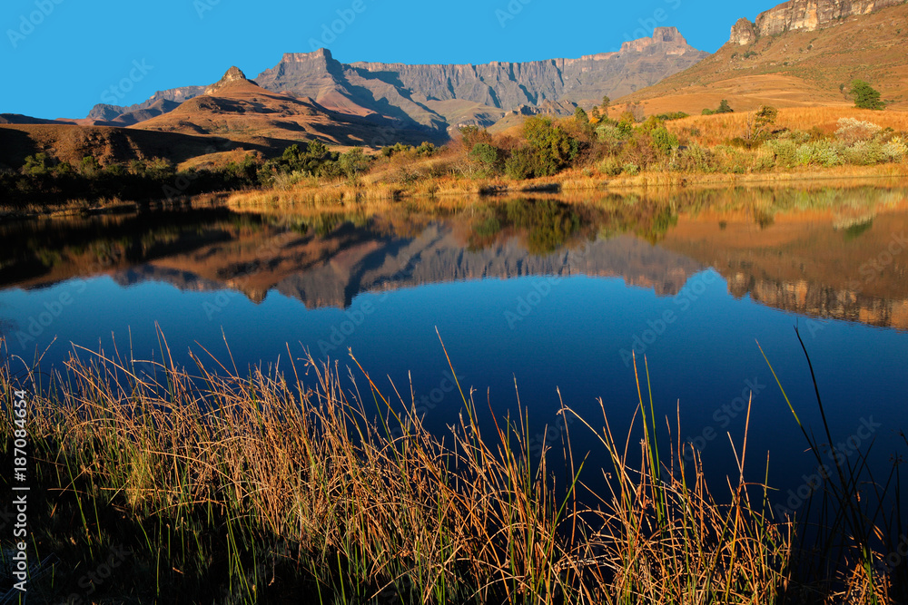 Mountains with reflection in water, Royal Natal National Park, South Africa.