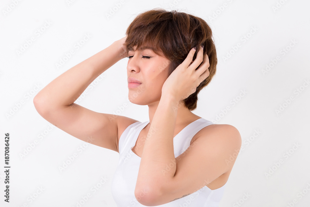 Health and pain. Stressed exhausted young woman having strong tension headache. Isolated on white background. Studio lighting. Concept for healthy and medical Health and pain. Stressed exhausted young woman having strong tension headache. Isolated on white background. Studio lighting. Concept for healthy and medical