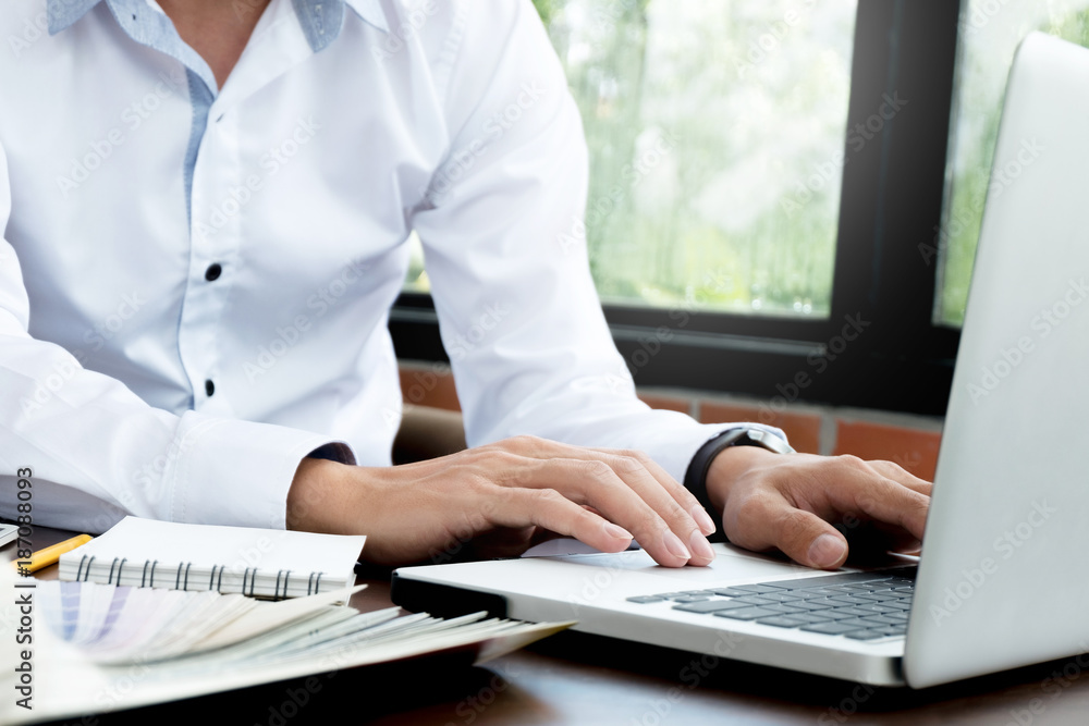 Graphic designer job with colour charts at a modern office Graphic designer job with colour charts at a modern office